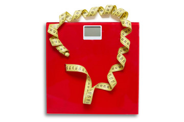 Lose weight concept. Scales and measuring tape on white background. Red bathroom weights with blank display window for your own figures or numbers