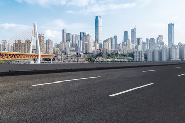 Road ground and Chongqing urban architectural landscape skyline