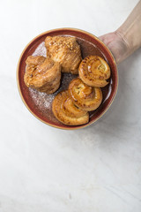 freshly baked buns with almonds. Croissants