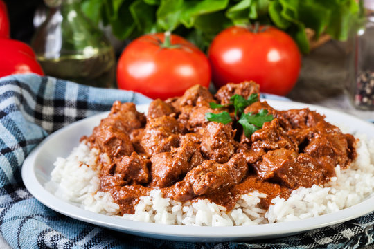 Chicken tikka masala served with rice