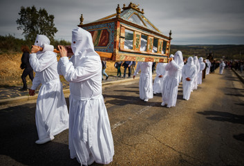 Easter traditional procession with coffin and tourists