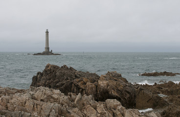 Fototapeta premium bord de mer avec rocher et phare