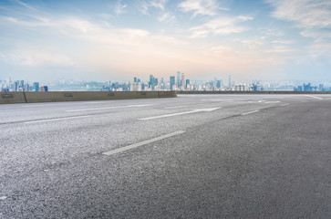 Fototapeta premium Road ground and Chongqing urban architectural landscape skyline