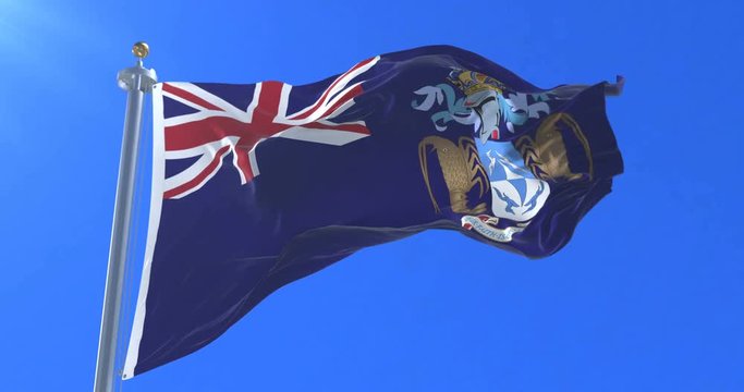 Tristan da Cunha flag waving at wind in slow with blue sky, loop