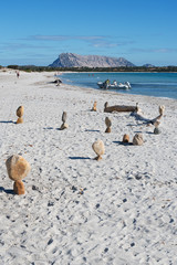 Stones in balance on the sardinian beach.