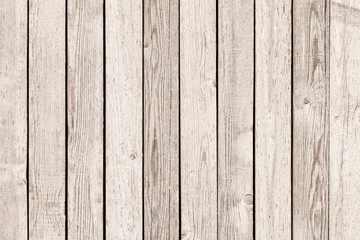 Old rustic wooden fence painted into white long time ago - outdoors shot