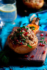 Stuffed pumpkin with couscous.selective focus
