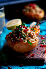 Stuffed pumpkin with couscous.selective focus
