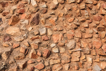 Colorful natural stone wall texture background.
