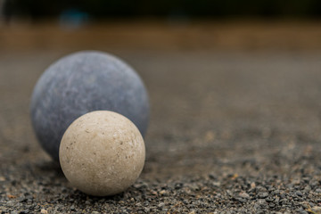 White Bocce Ball with Blue Ball Close Copy Space Right