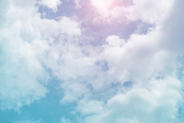 sun and cloud background with a pastel colored


