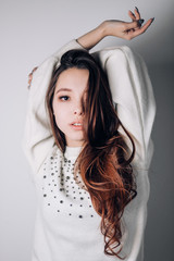 Fototapeta premium Portrait of a sexy beautiful woman on white background