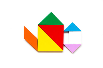 Fototapeta premium Color wood tangram puzzle in water pot shape on white background