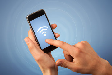 Female hand holding smartphone