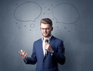 Businessman holding microphone