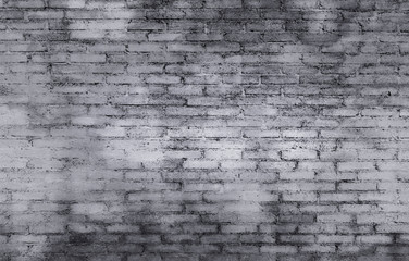 Old brick wall texture background with gray and white color on the surface.