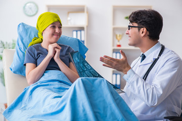 Cancer patient visiting doctor for medical consultation in clini