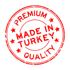 Grunge red premium quality made in Turkey round rubber seal stamp on white background