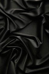 Background of black satin fabric