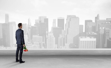 Fototapeta premium Businessman looking at a big city panorama