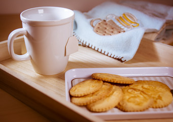 Breakfast scene. White blank mug with cookies