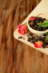 Leaf tea, dried rose and fresh mint for making a hot drink