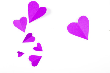 Origami paper heart purple color on white background.