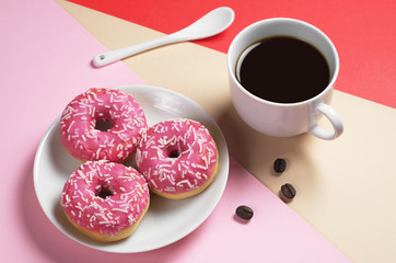 Pink donuts and coffee