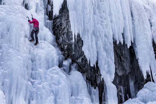 Woman Ice Climbing