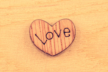 Wooden heart with the word love