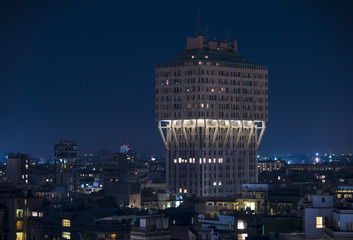 Cityscape of Milan (Italy): The famous skyscraper called Torre Velasca, built in the 50s; night...