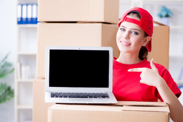 Young woman delivering boxes of personal effects