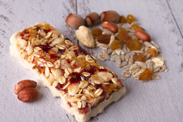 useful sweetness from nuts, oatmeal, honey, red berries, chocolate, raisins, dried apricots