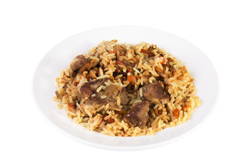 Aromatic pilaf on a plate with meat and spices