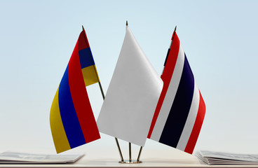 Flags of Armenia and Thailand with a white flag in the middle