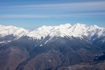 panorama of snow ridge on cloudy background