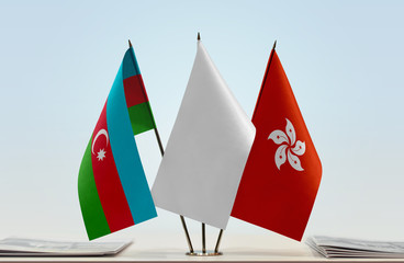 Flags of Azerbaijan and Hong Kong with a white flag in the middle
