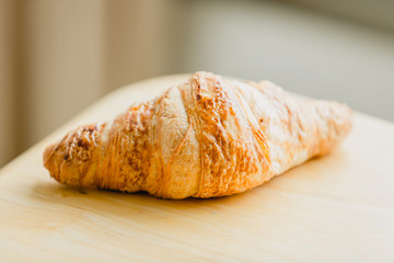 A fresh delicious croissant baked with natural butter.