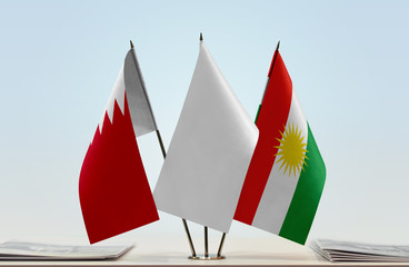 Flags of Bahrain and Kurdistan with a white flag in the middle