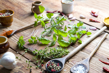 Aromatic fresh spices on wood