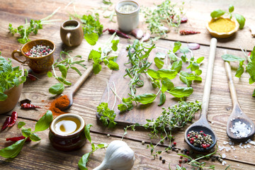 Aromatic fresh spices on wood