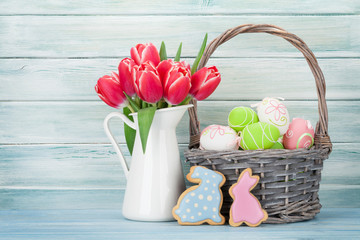 Red tulip flowers and easter eggs
