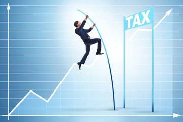 Businessman jumping over tax in tax evasion avoidance concept