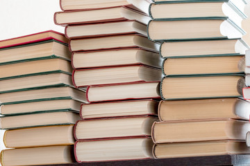 a large pile of old books