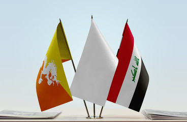 Flags of Bhutan and Iraq with a white flag in the middle