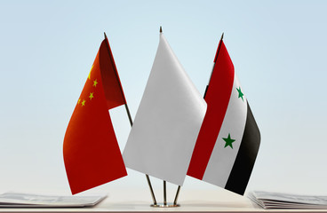 Flags of China and Syria with a white flag in the middle