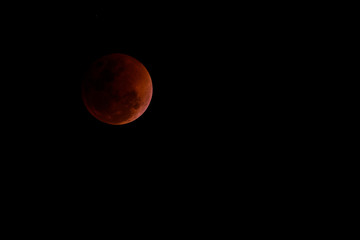 Total lunar eclipse or blood moon.