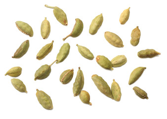 Pile of green Cardamom, cardamon or cardamum (dried fruits of Elettaria cardamomum) isolated on white. shadow separated top view
