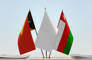  Flags of East Timor and Oman with a white flag in the middle