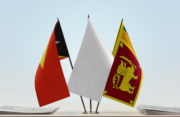  Flags of East Timor and Sri Lanka with a white flag in the middle
